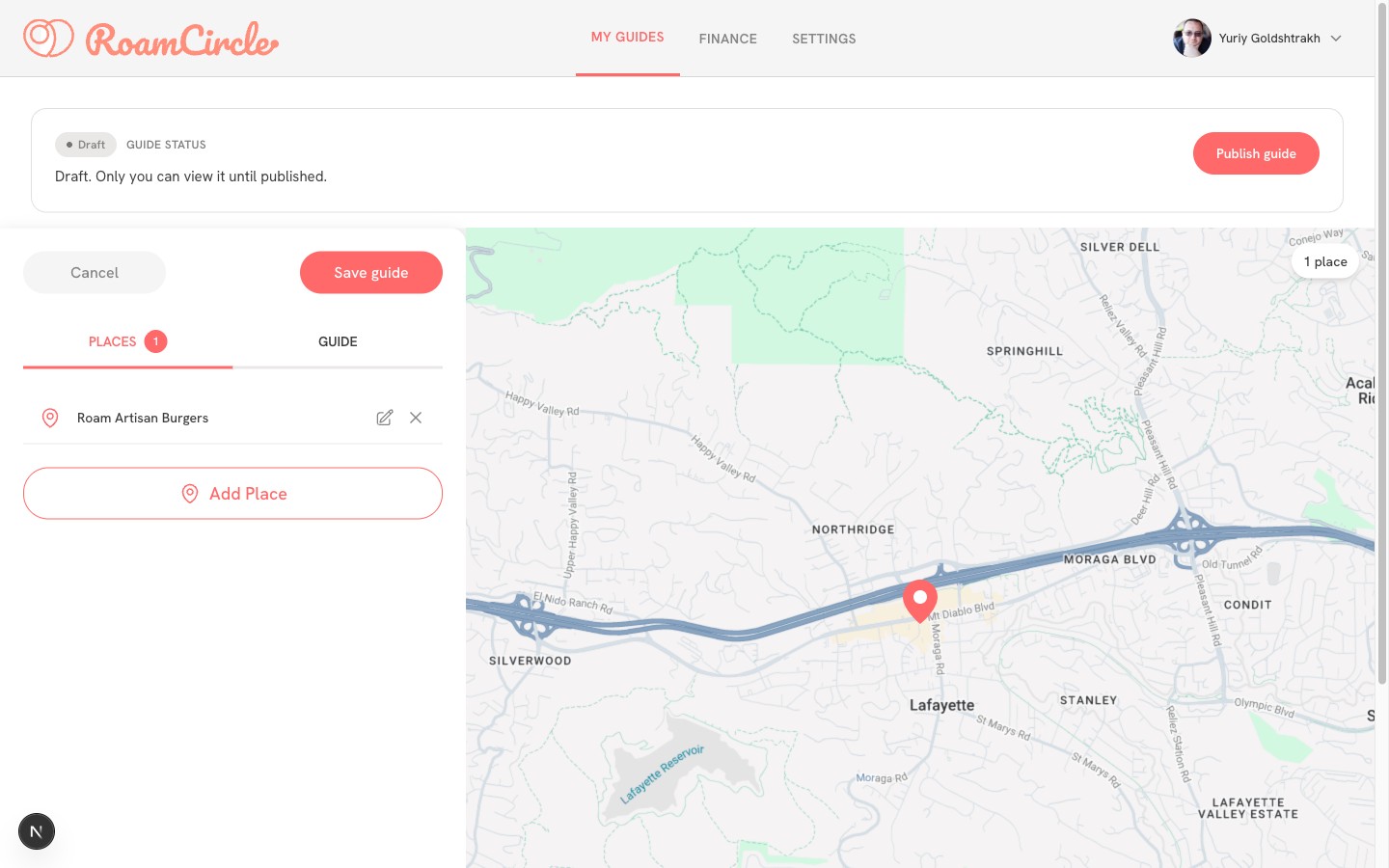 RoamCircle guide editor: a place added to a guide beside a map with a coral location pin